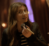 Teen girl applying makeup