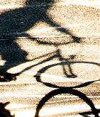 Shadow of person riding a bicycle